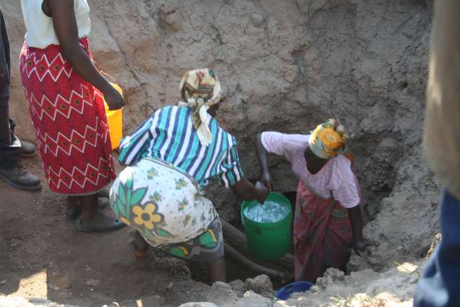 An open well feeding 700 families at the village of Thundira , Mzimba District