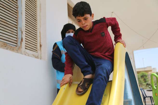 Boy on slide